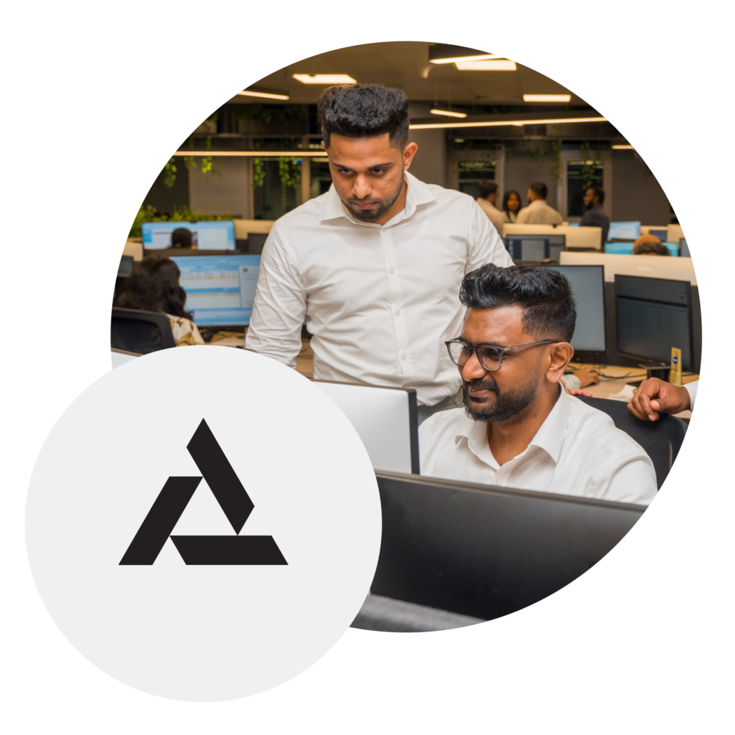 Apexia team working on computer